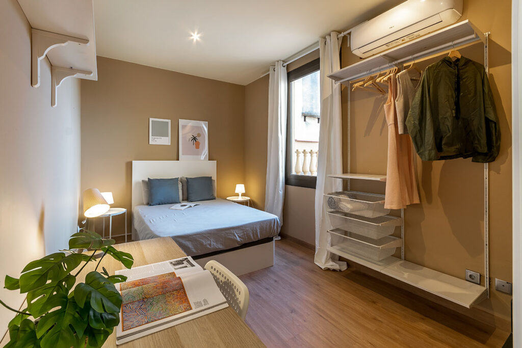 bright bedroom with desk in Barcelona coliving